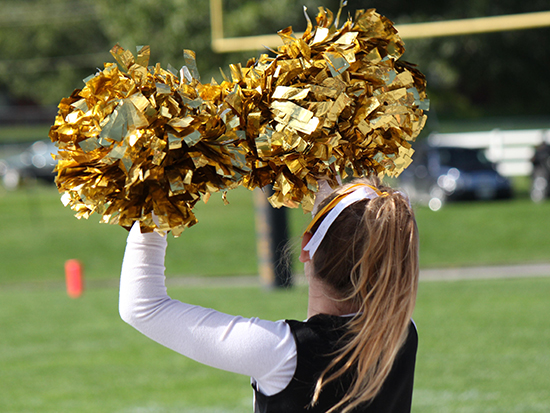 Cheerleader with Pom Poms